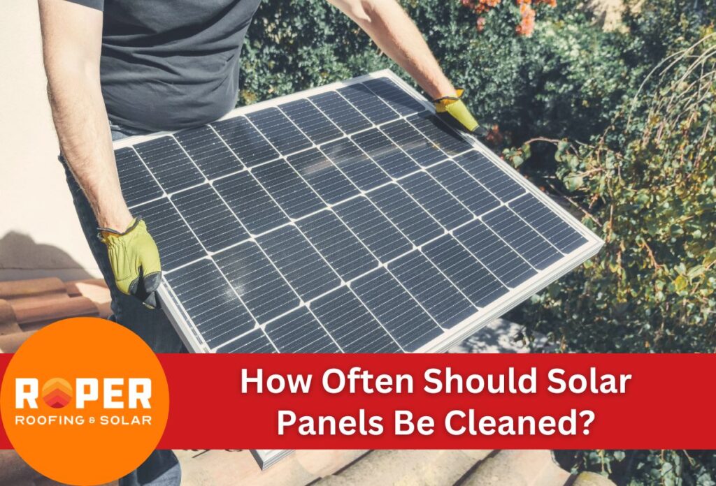 man holding solar panel