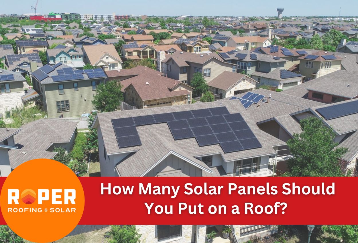 Aerial view of residential neighborhood with solar panels on house rooftops