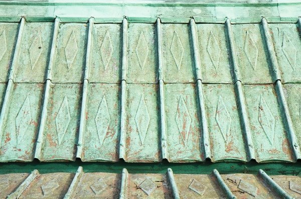 old and dirty copper roof with patina