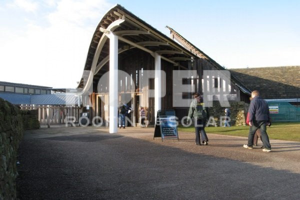 a-curved-roof-sported-by-a-bar