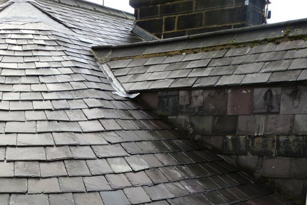 Signs That Your Slate Roof Needs, Replace A Broken Slate Tile